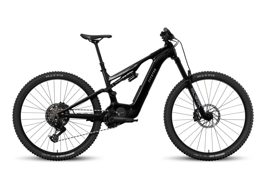 Side view of a black Aventon Current EXP carbon full-suspension electric mountain bike with a RockShox Lyrik fork, Maxxis tires and a mid-mounted Ultro X motor on a white background