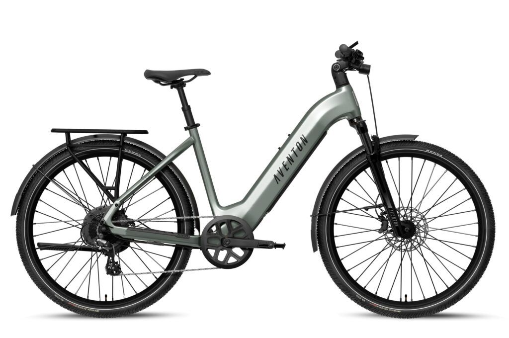 Side view of a sage green Aventon Level 4 REC step-through commuter e-bike with a low entry frame, rear rack, fenders and suspension fork on a white background.