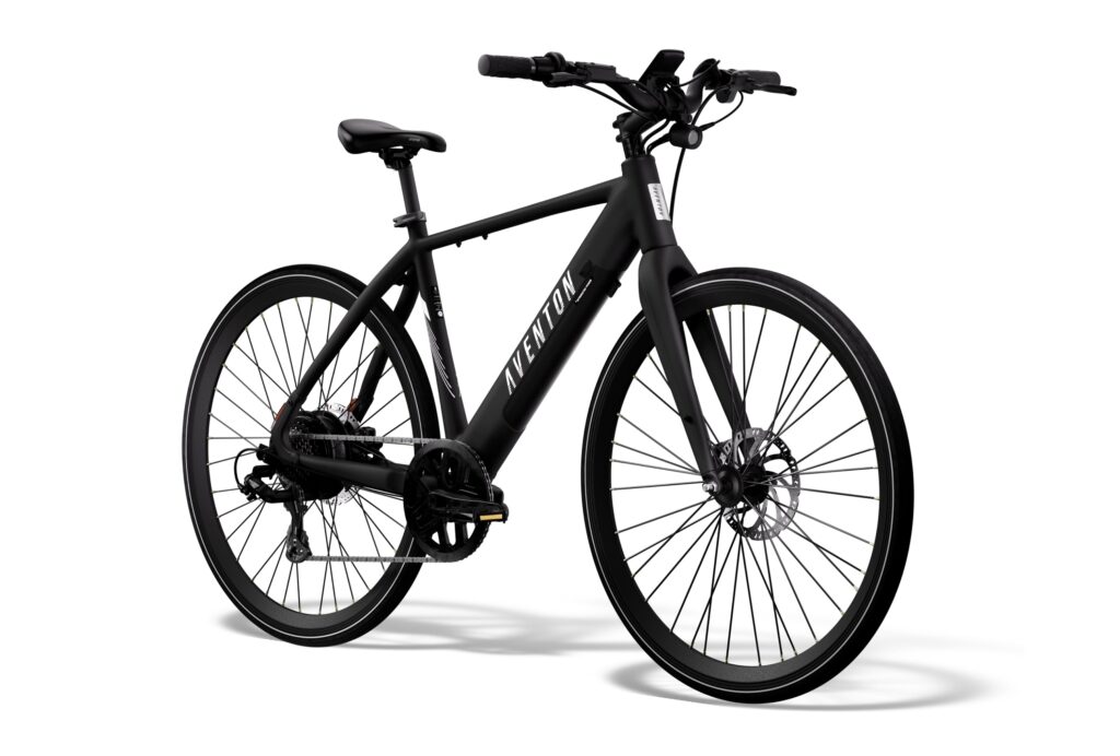 Three-quarter front view of a black Aventon Soltera 2.5 city e-bike with a high-step aluminum frame, flat handlebar, hydraulic disc brakes and slim road-style tires on a white background.
