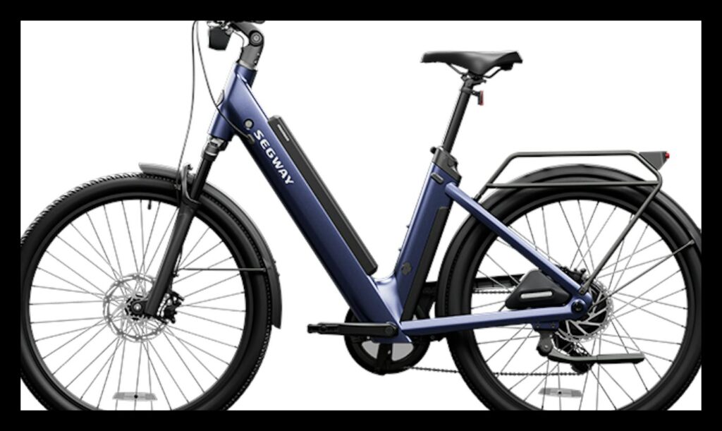 Segway Myon step-through electric commuter bike in navy blue, left-side profile on a white background, showing its frame-mounted battery, front suspension fork, full fenders, disc brakes, black saddle and rear cargo rack.